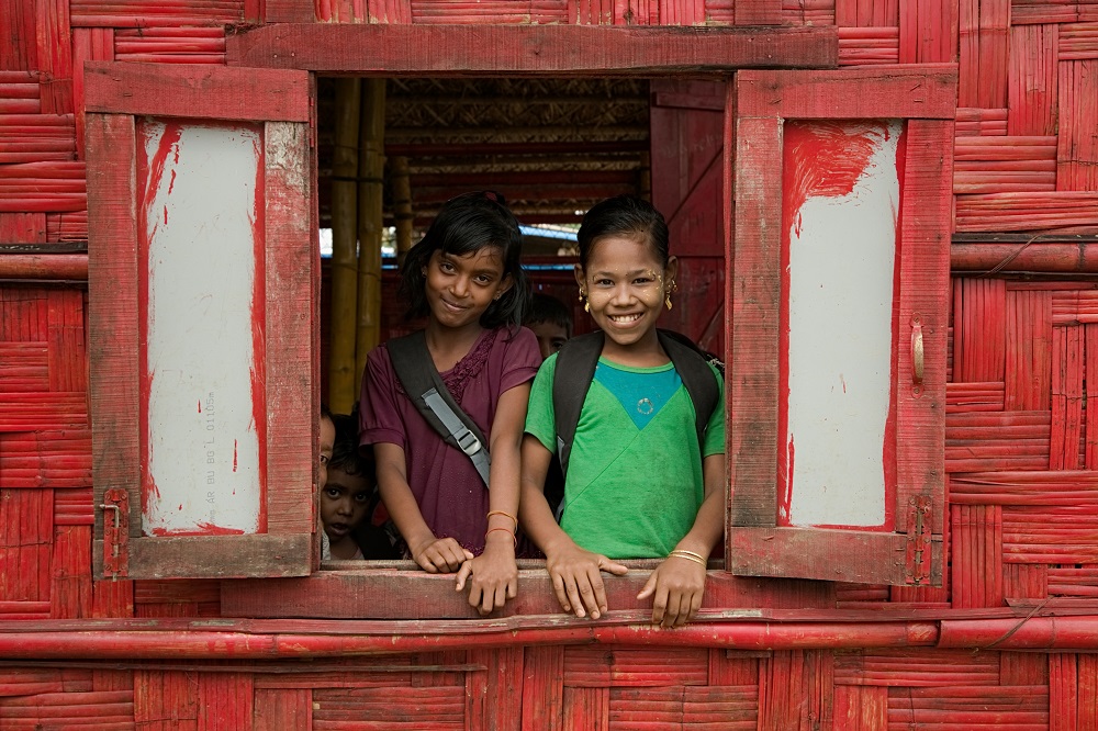 Children smiling in Bangaldesh.