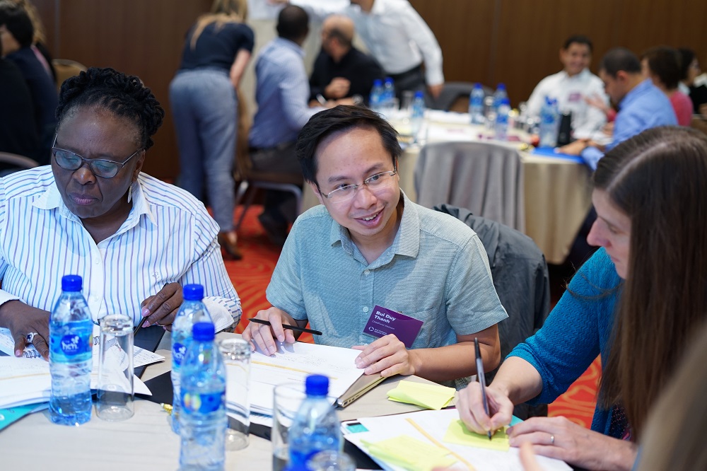 Duy Thanh Bui, Online Safety Regional Specialist at ChildFund Vietnam, engages with other grantees at End Violence’s grantee convening in Addis Ababa, Ethiopia. 